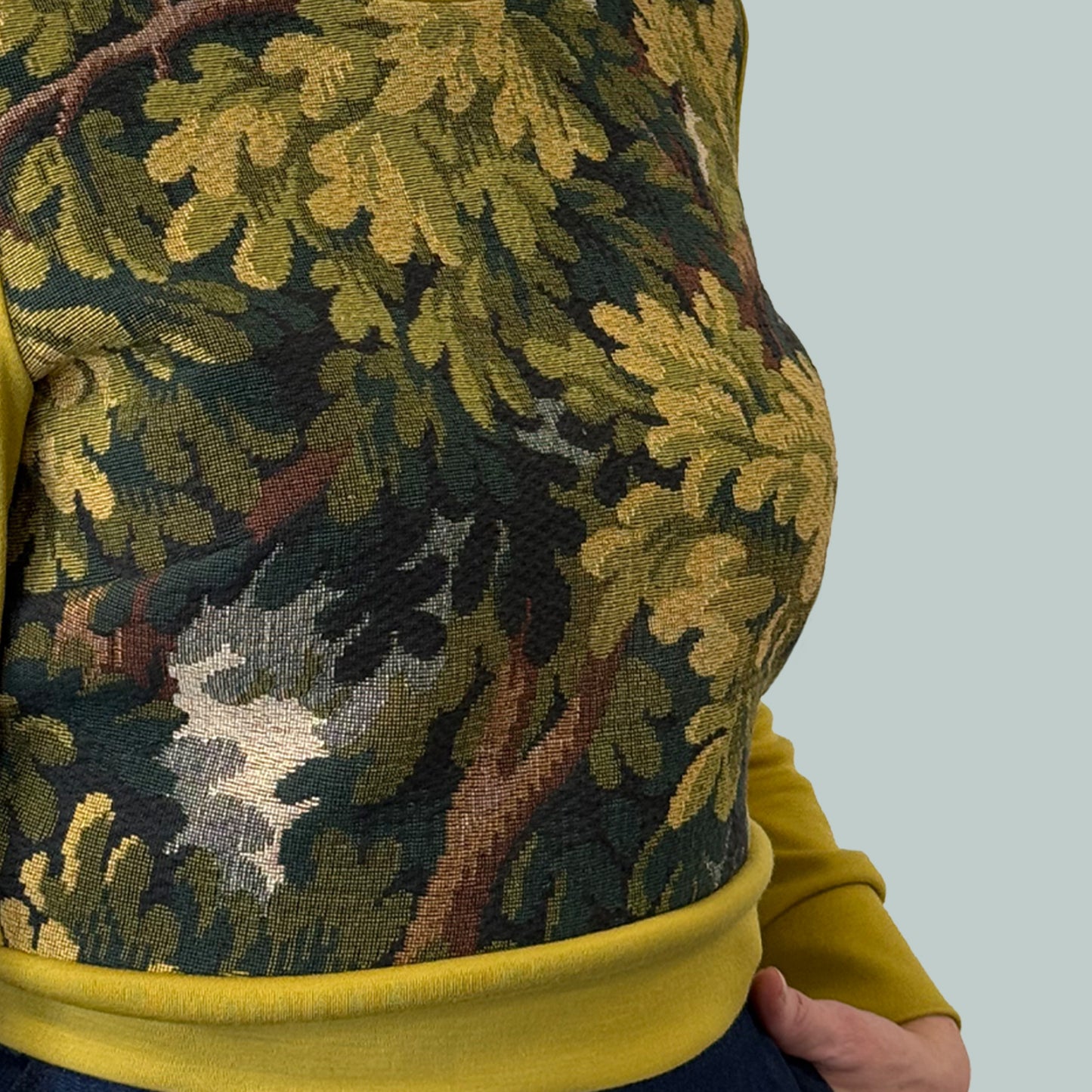Cropped ladies' sweater with tapestry front and chartreuse Laurent Garigue wool sleeves and back, close up of tapestry fabric