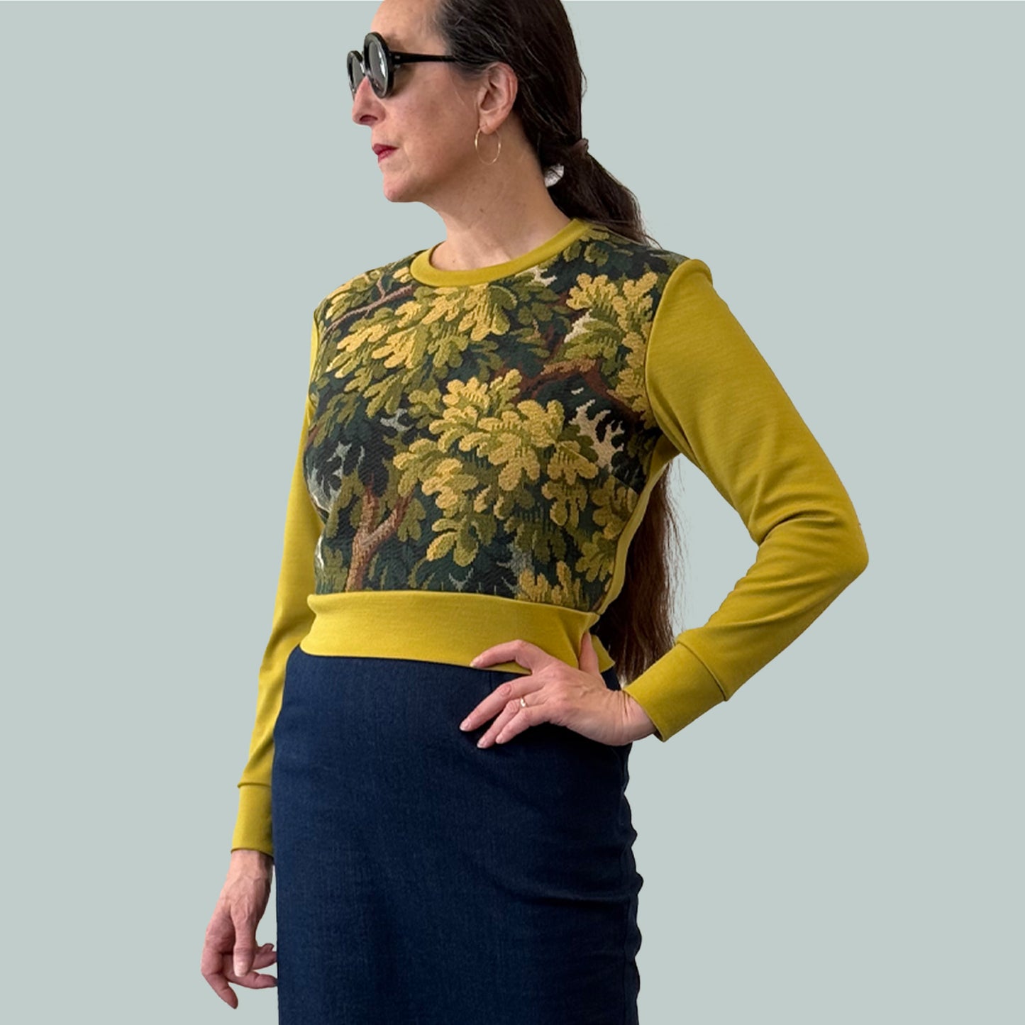 Cropped ladies' sweater with tapestry front and chartreuse Laurent Garigue wool sleeves and back, side torso view