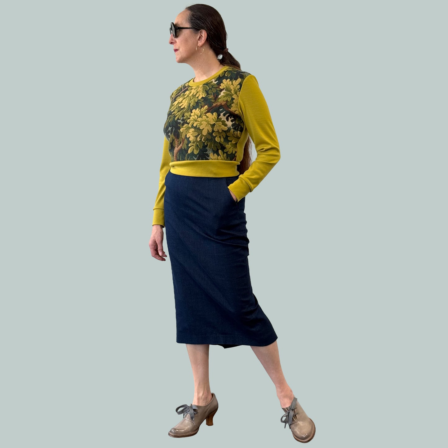Cropped ladies' sweater with tapestry front and chartreuse Laurent Garigue wool sleeves and back, full body side view