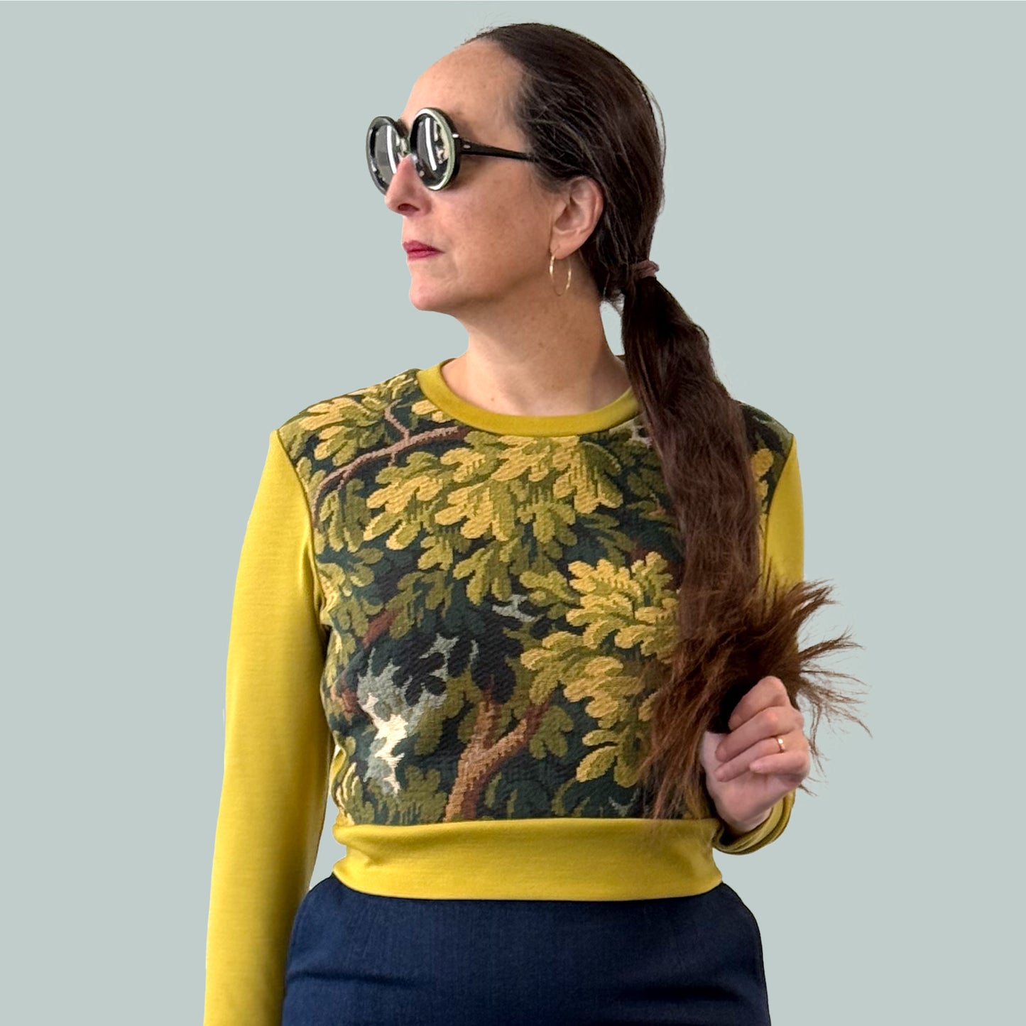 Cropped ladies' sweater with tapestry front and chartreuse Laurent Garigue wool sleeves and back, front view torso