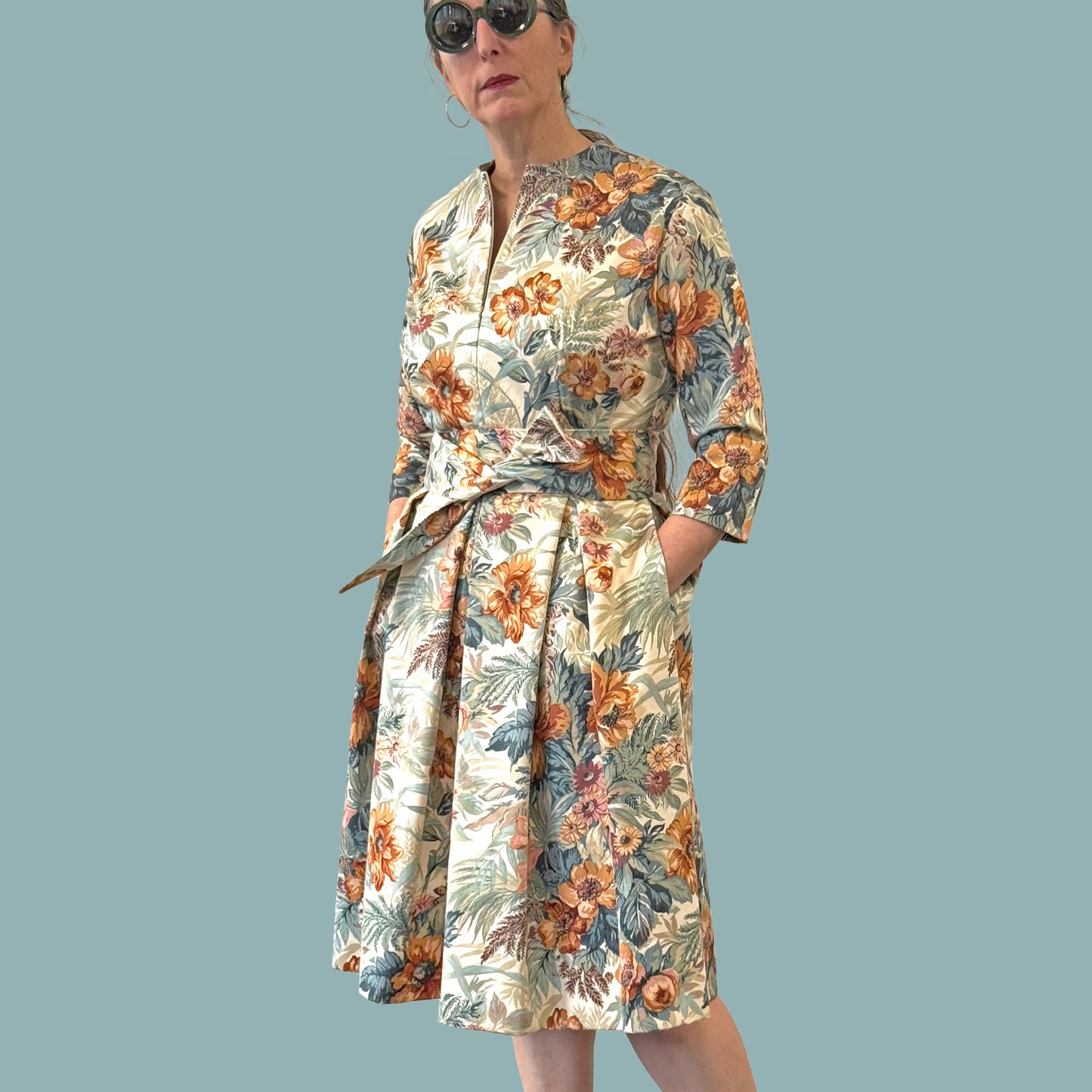 1950s style shirtwaist dress in vintage English chintz fabric full side view with hands in pockets