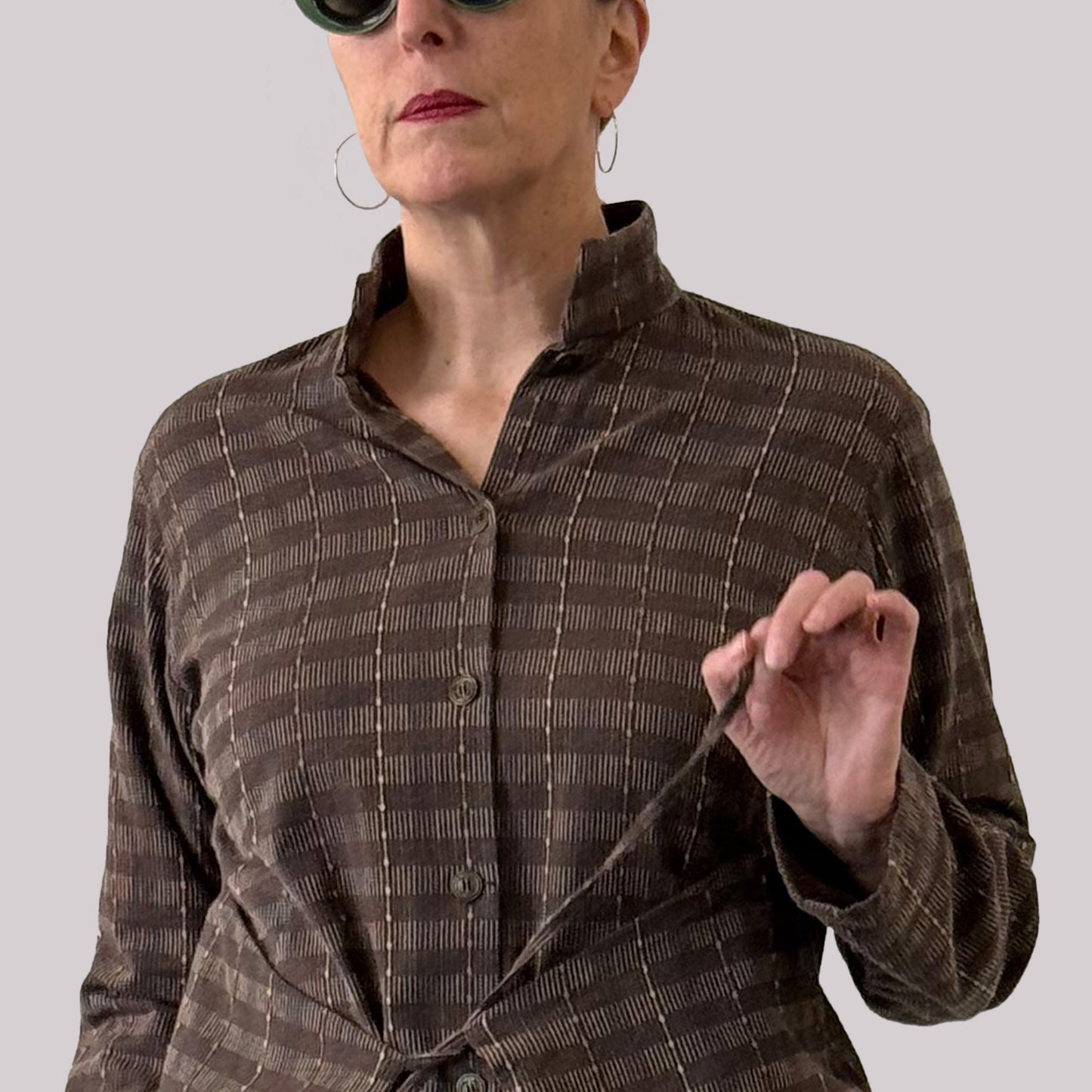 Ladies shirt made of vintage brown Japanese dobby cotton fabric, close ip of fabric