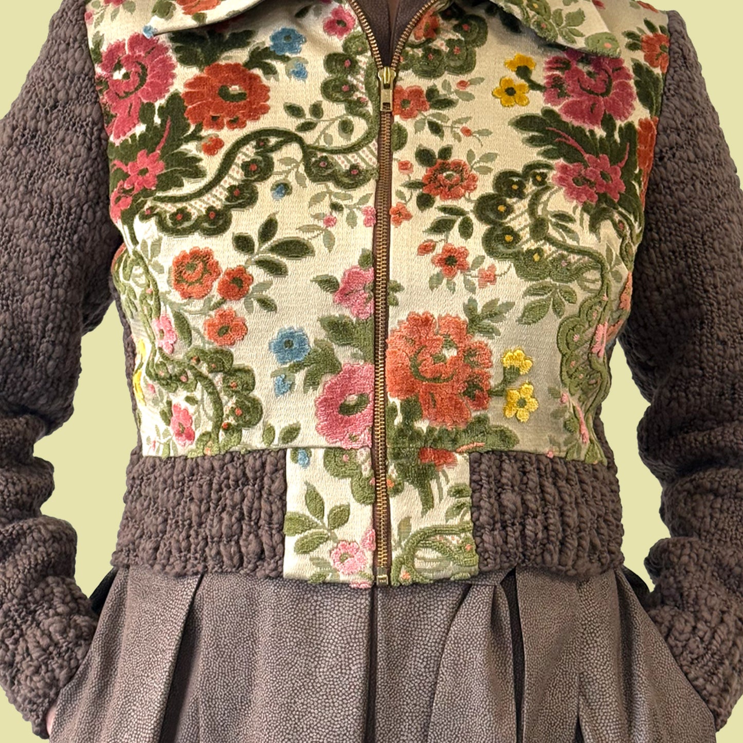 cropped jacket with vintage 1940s tapestry front and hand knitted sleeves and back, close up of zipper